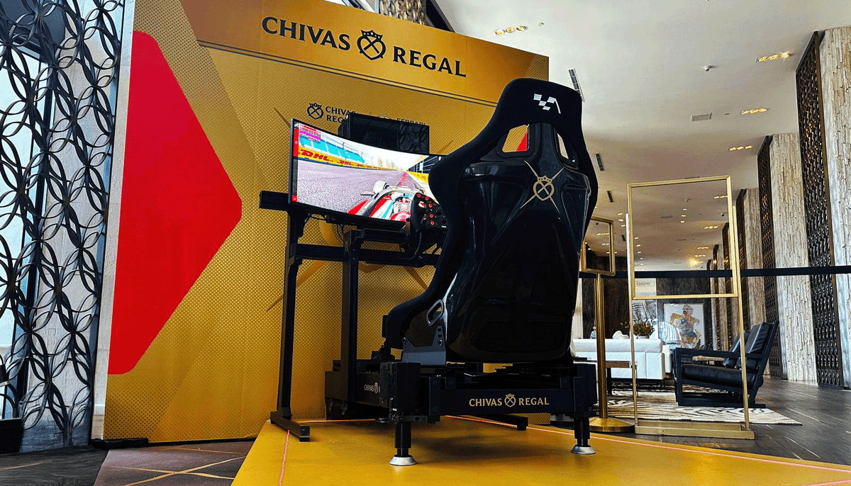 Chivas Regal branded F1 racing simulator at a Miami event