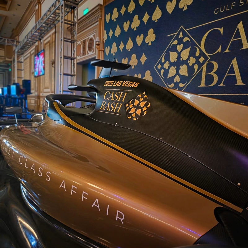 Custom gold show car at a brand event